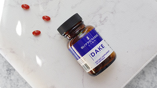 Bottle of DAKE™ shown